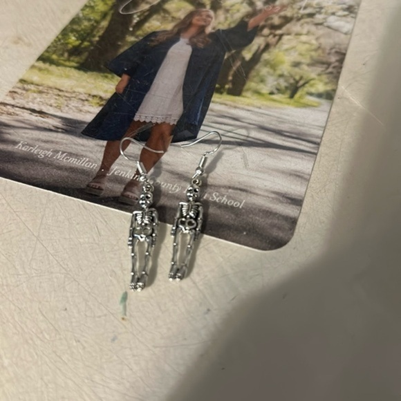 None Jewelry - Skeleton earrings